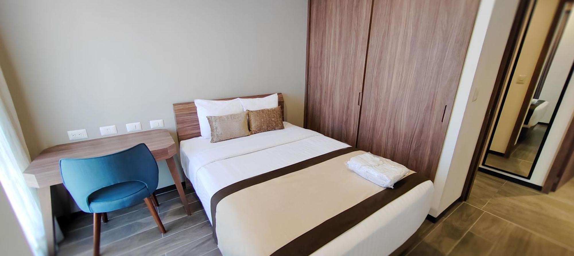 Fujitaya Queretaro Hotel Exterior photo A bedroom in a hotel